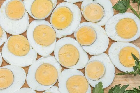 Boiled eggs cut in halves Stock Photos