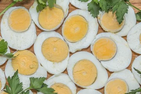Boiled eggs cut in halves Stock Photos