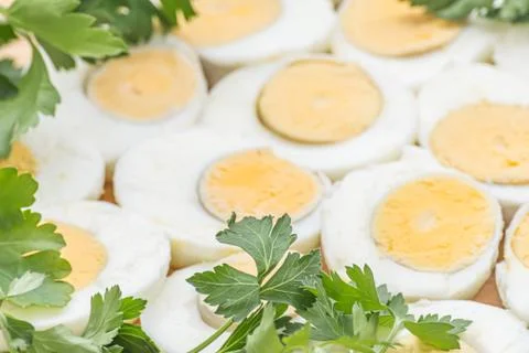 Boiled eggs cut in halves Stock Photos