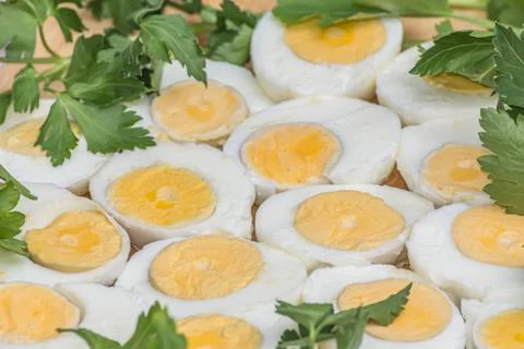 Boiled eggs cut in halves Stock Photos