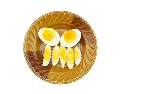 Boiled eggs cut isolated Foto stock