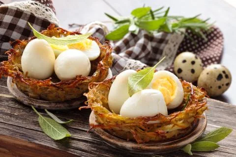 Boiled eggs in nests. Stock Photos