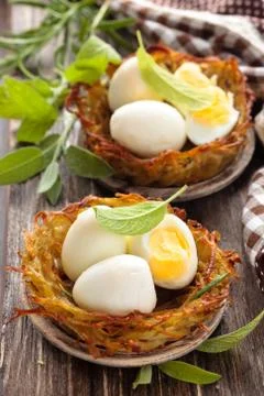 Boiled eggs in nests. Stock Photos