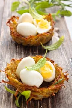 Boiled eggs in nests. Stock Photos