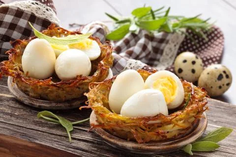 Boiled eggs in nests. Stock Photos