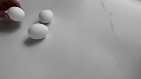 Boiled eggs placed on table cooking preparation Stock Footage 332059620