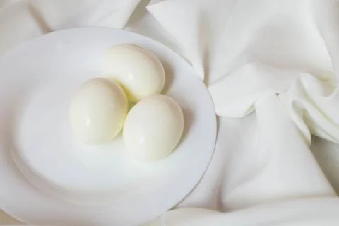 Boiled eggs on a plate Stock Photos