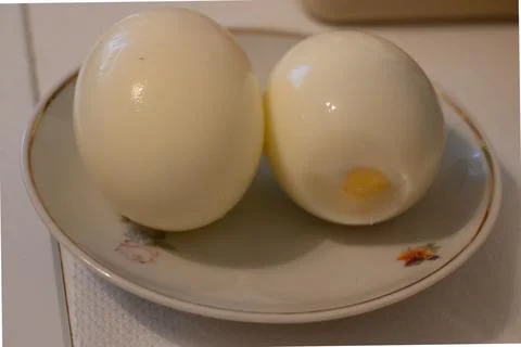 Boiled eggs on a plate Stock Photos