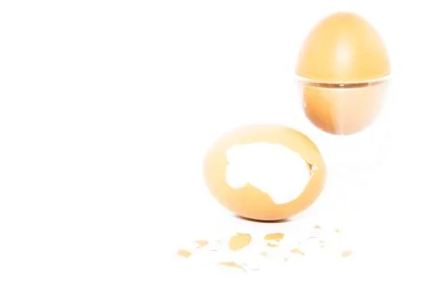 Boiled eggs in shot glass with eggshell Stock Photos