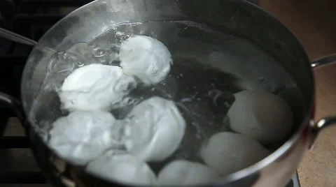 Boiled eggs in a skillet Stock Footage 49078552