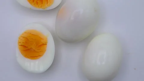 Boiled Eggs On White Background Rotating. 库存影片 197730944