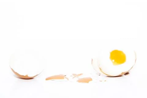 Boiled orange egg yolk with eggshell Stock Photos