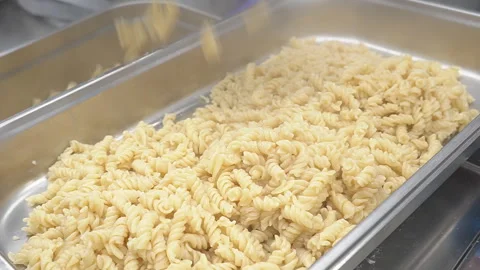 Boiled pasta in a large container in a restaurant Stock Footage 302751508