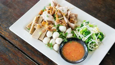 Boiled pork dip with hot and sour sauce (Thai food). Stock Photos