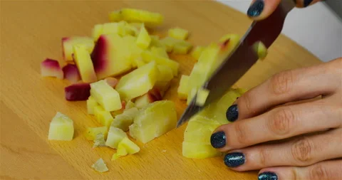 Boiled potatoes cut into cubes for salad Stock Footage 101840770