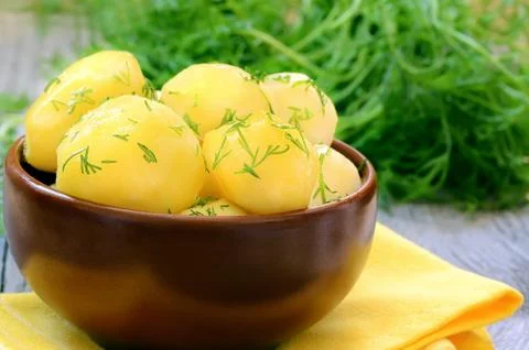 Boiled potatoes with dill Stock Photos