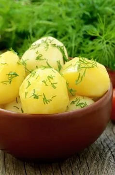 Boiled potatoes with dill Stock Photos
