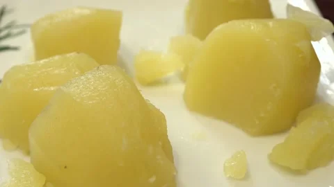 Boiled potatoes on a dish and fork Stock Footage 155685524