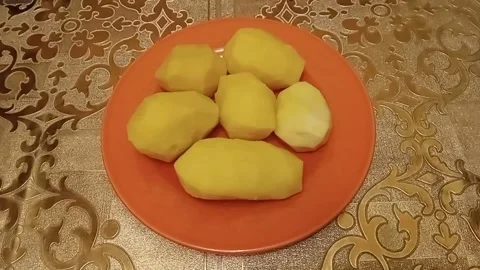 Boiled potatoes on a plate Stock Footage 227295486