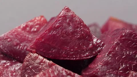 Boiled red beetroot cut into pieces, close-up shot video Stock Footage 323867342