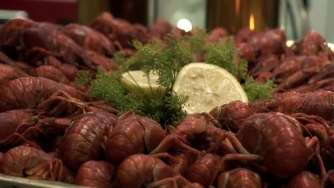 Boiled red crayfish on a plate with lemon Stock Footage 114122139