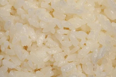 Boiled rice macro texture background. Photos