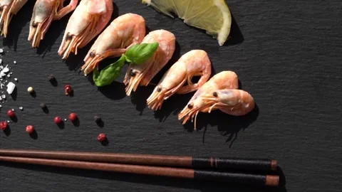 Boiled shrimp on black background Stock Footage 150183423