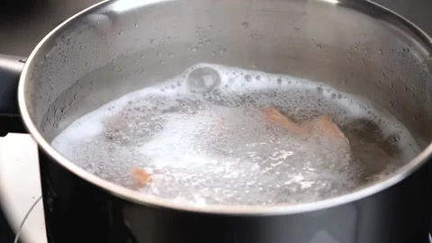 Boiled shrimp until matured seeing boiled water almost it overflows. Stock-Footage 142430791