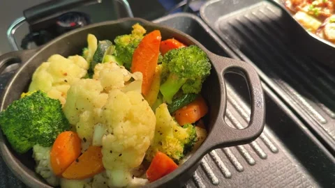 Boiled vegetables cabbage kohlrabi broccoli Vegetable casserole dish Stock Footage 310728593
