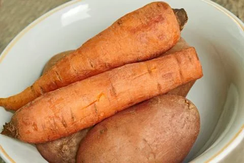 Boiled vegetables on a plate Stock Photos