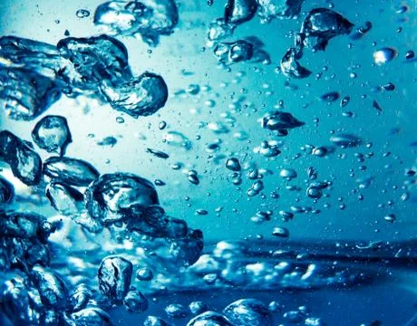 Boiled water with bubbles background Stock Photos
