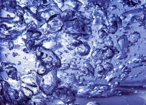 Boiled water with bubbles background Stock Photos
