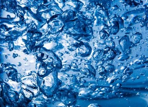 Boiled water with bubbles background Stock Photos