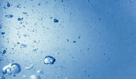 Boiled water with bubbles background Stock Photos
