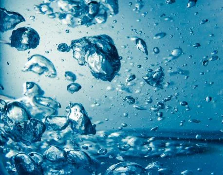Boiled water with bubbles Stock Photos