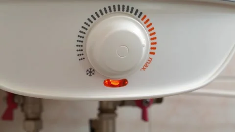 Boiler with temperature regulator of heating cold water. Boiler heats the water Stock Footage 318251254