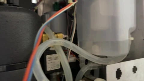 Boiler unit inside coffee vending machine, heating system component for Stock Footage 337116937