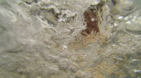 Boiling and bubbling water Stock Footage 25423353