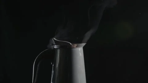 Boiling and steaming pump coffee machine and left hand takes away steaming pump Stock Footage 264767486