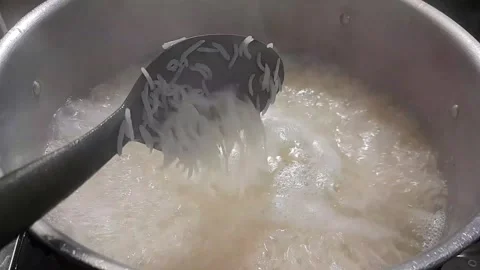 Boiling Basmati rice video footage Stock Footage 333543892