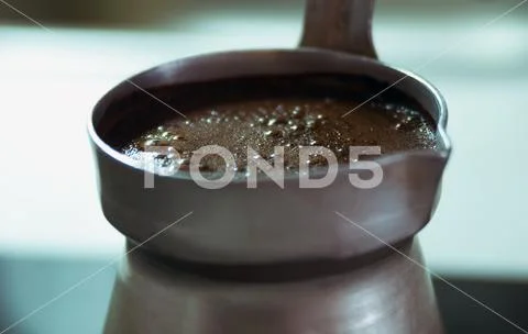 Boiling black coffee macro closeup Stock Photos
