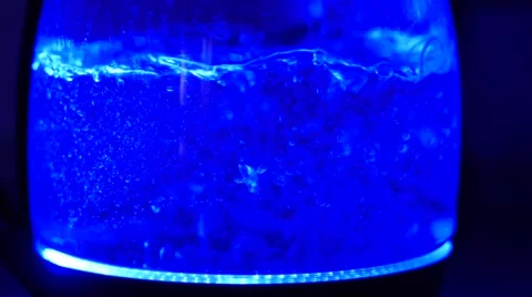 Boiling blue kettle in the dark Stock Footage 49823521
