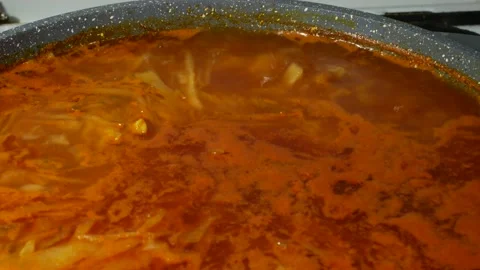 Boiling borscht in a saucepan Stock Footage 164875406