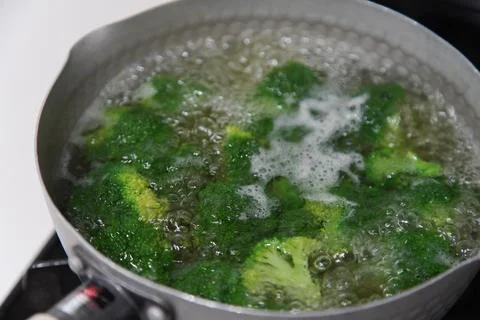 Boiling broccoli Stock Photos
