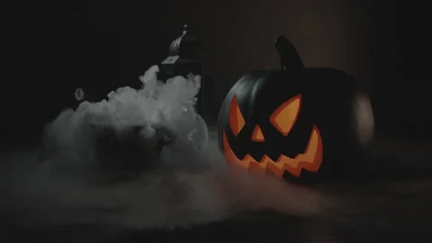 Boiling Cauldron Spewing Plumes of Smoke Next To Jack-O-Lantern | Halloween Stock Footage 138238329