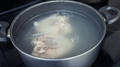 Boiling Chicken Breast in Pot. Stock Footage 338341340