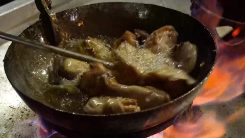 Boiling Chicken curry and adding garam m... | Stock Video | Pond5
