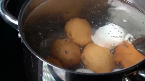 Boiling chicken eggs Stock Footage 157151422