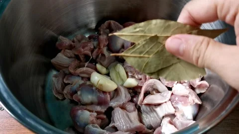 Boiling Chicken Gizzard with herbs Stock Footage 149406224