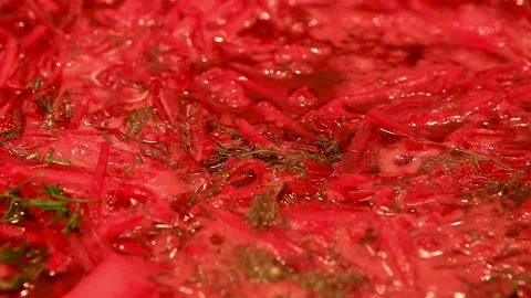 Boiling chopped beets in a saucepan. Stock Footage 176390372